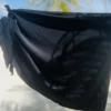 Black microfiber beach pareo from Tiara Galiano, smooth lightweight wrap that packs down small and ties at the waist.