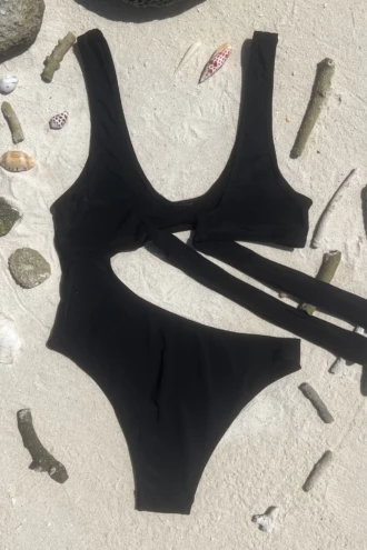 Black scoop-front swimsuit with Brazilian back coverage in smooth light polyamide swim fabric.