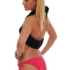 Candy pink tie-side bikini bottom with a moderate front and a cheeky back, slim ties knotting at each hip.