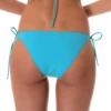 Bright patchwork swim bottom with moderate front and cheeky back, knot-to-fit side ties, stretchy and quick to dry.