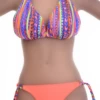 Solid coral bikini bottom with adjustable side ties and standard coverage for women.
