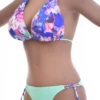 Pink-and-blue floral triangle bikini set with mint green tie-side bottom in smooth polyamide.