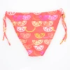 Coral girls' swim bottom with a fruity orange and lemon print and adjustable side ties, light quick-drying fabric for sunny days.