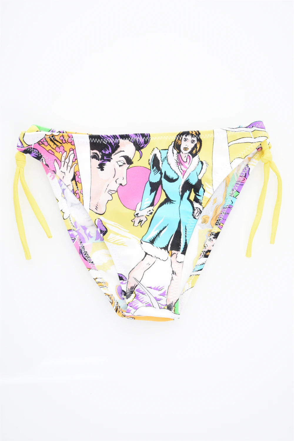 Girls' tie-side bikini bottom by Tiara Galiano in a colorful pop-art comic print on a yellow base with matching side ties, quick-drying polyamide.