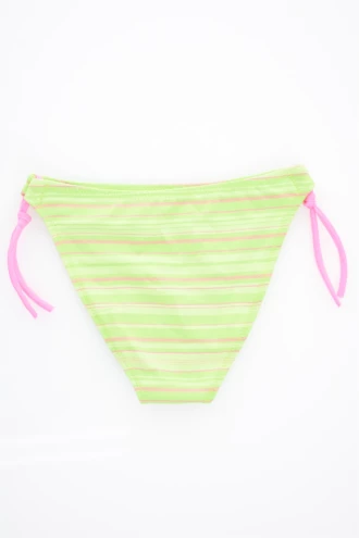 Green-striped girls' swim bottom with pink adjustable side ties, gently stretchy quick-drying fabric for warm days by the water.
