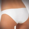 Seamless cotton bikini briefs by JADEA with no seams or elastic, leaving no lines under clothes.