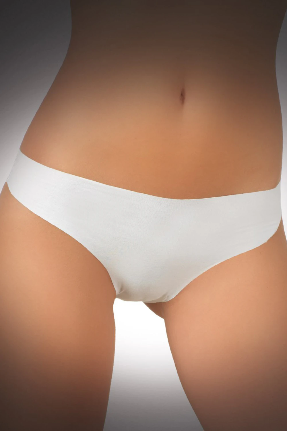JADEA seamless cotton bikini briefs with laser-cut edges and a cheeky cut that stays invisible.