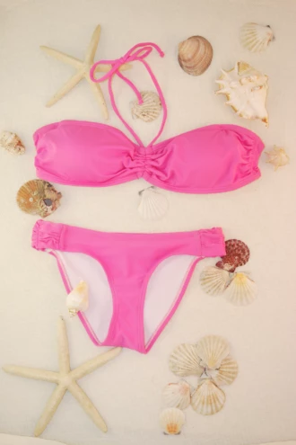 Solid pink bikini bottom with standard bikini coverage in lightweight quick-drying polyamide.