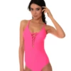 Hot pink lace-up one-piece swimsuit with plunging V-neckline in light quick-drying polyamide.