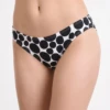 Black-and-white polka-dot Brazilian-cut bikini bottom with oversized dots and a V-shaped back.