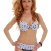 Black-and-white polka-dot bikini set with underwire push-up cups in smooth polyamide swim fabric.