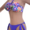 Purple floral bikini bottom with adjustable side ties and standard coverage in quick-drying fabric.