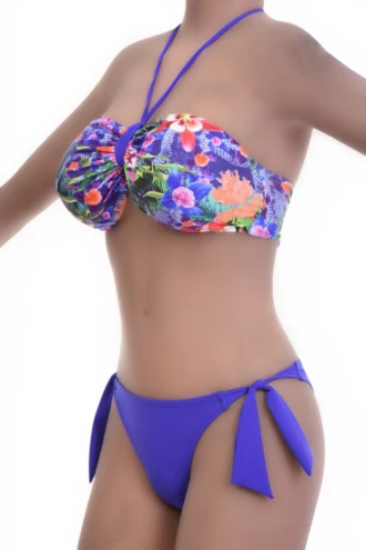 Purple floral bikini bottom with adjustable side ties and standard coverage in quick-drying fabric.