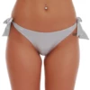 Silver swim bottom with bow ties that set the fit, light and quick-drying and smooth against the skin.