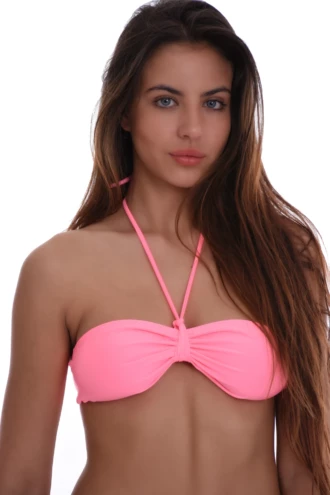 Strapless bandeau bikini top in soft pink with a gentle center gather and a secure hook-and-eye back closure.