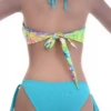 Convertible tie-dye bandeau top worn as halter or strapless with a tie back for women.