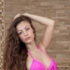 Triangle bikini top in polyamide with slim neck and tie-back straps that adjust both the fit and the lift.