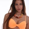 Underwire bikini top in polyamide with a hook-and-eye back and a soft center gather, quick-drying for the water.
