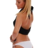 Crisp white cheeky bottom with knot hip ties for an adjustable fit and quick-drying stretch fabric.