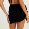 Black microfiber short sarong by Tiara Galiano, a soft rectangular wrap that ties over a swimsuit at the hips.