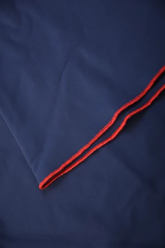 Dark blue microfiber short sarong by Tiara Galiano, a soft rectangular wrap that ties over a swimsuit at the hips.