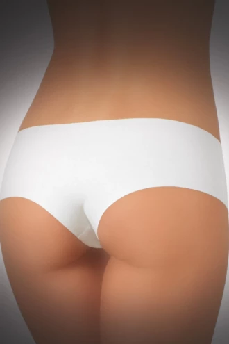 Seamless cotton boyshorts by JADEA with no elastic and laser-cut edges, a no-lines pair that sits under thin fabrics.