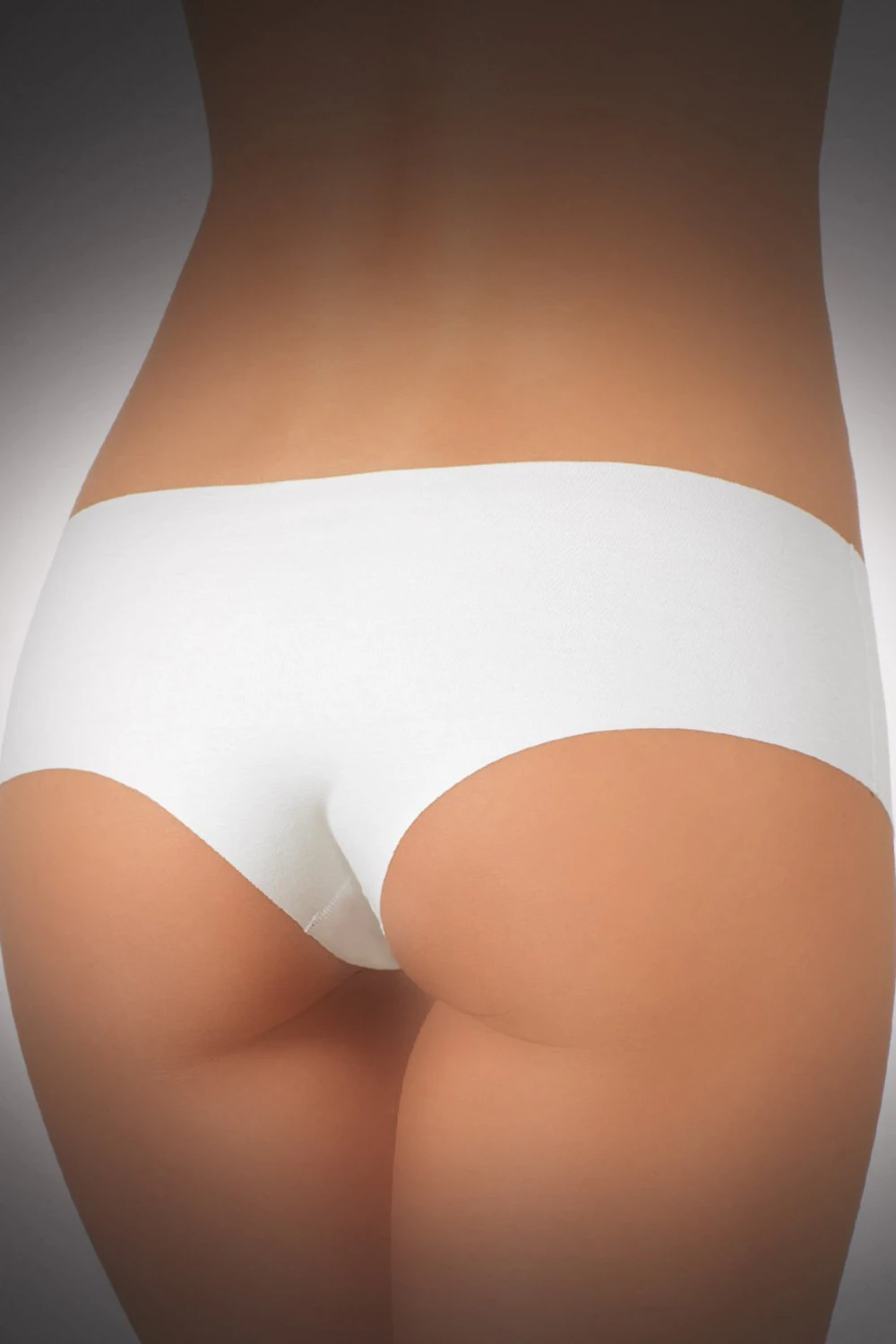 Seamless cotton boyshorts by JADEA with no elastic and laser-cut edges, a no-lines pair that sits under thin fabrics.