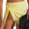 Sheer yellow mesh sarong wrap for women, one-size airy beach cover-up that knots low on the hips by the pool.